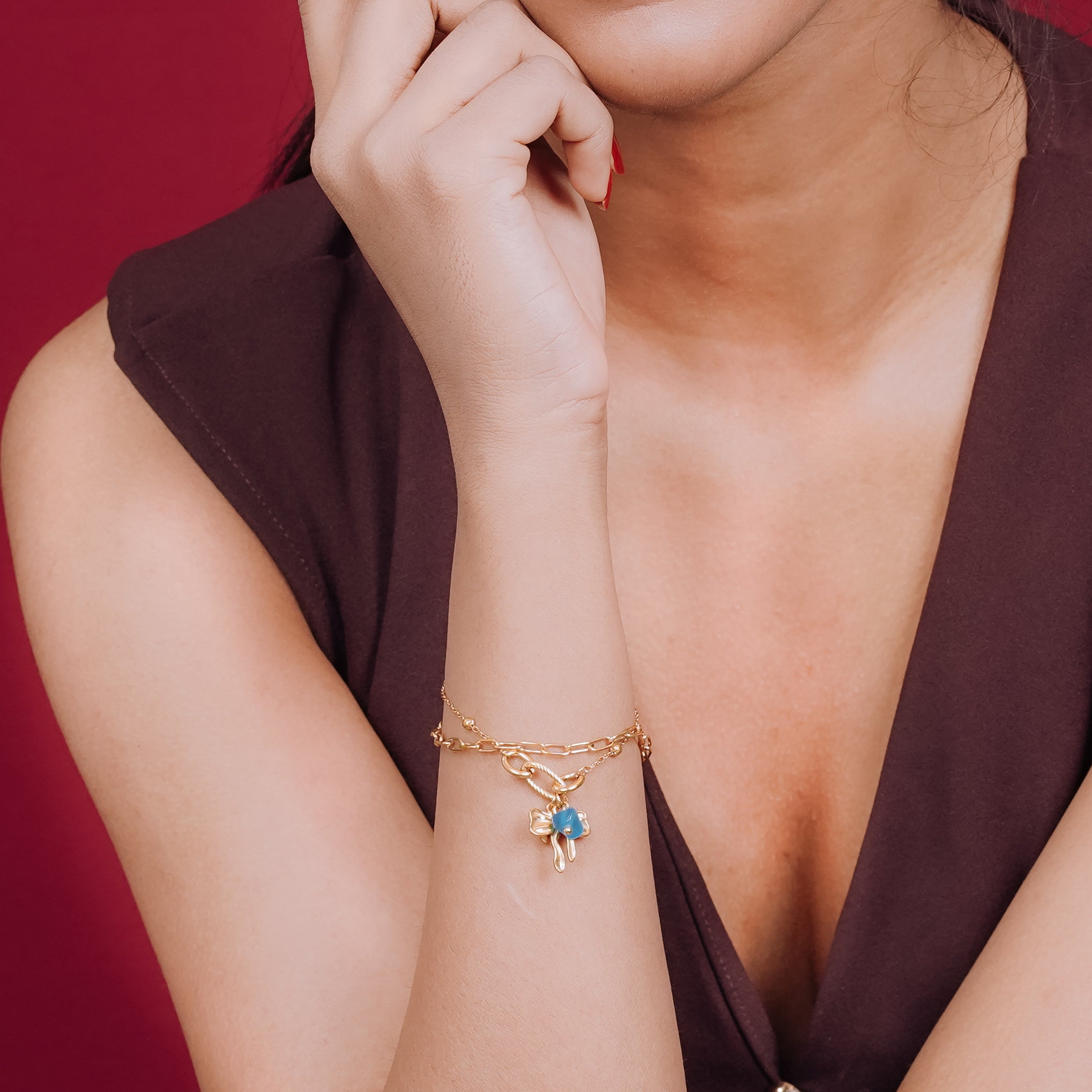Azure Bow Charm Strand Bracelet