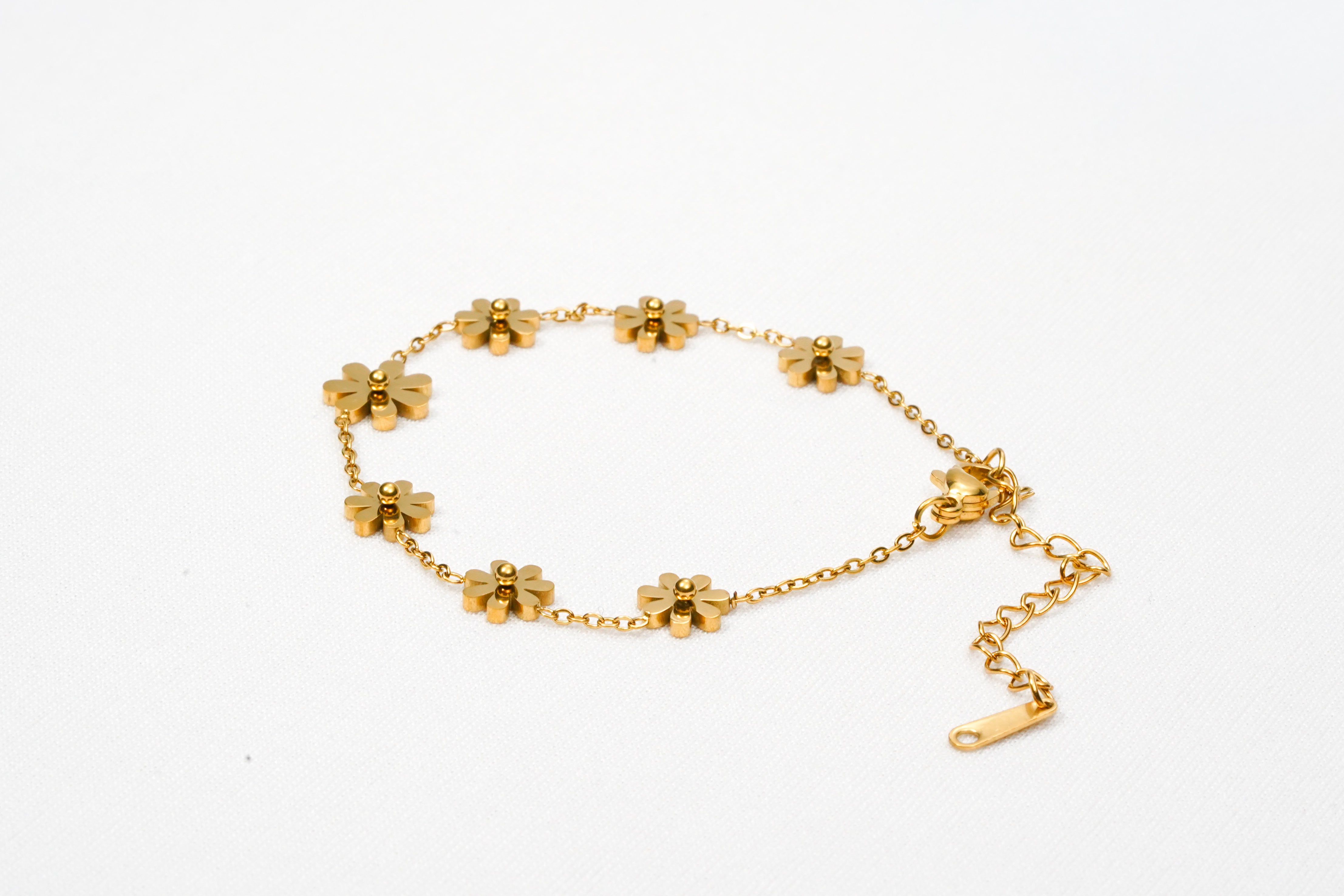 Seven Stationed Daisy Charms Bracelet