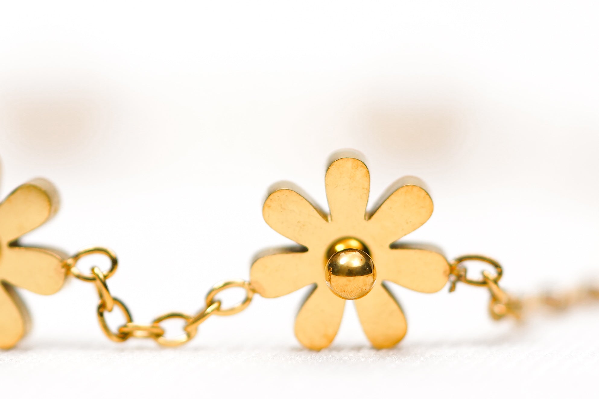 Seven Stationed Daisy Charms Bracelet