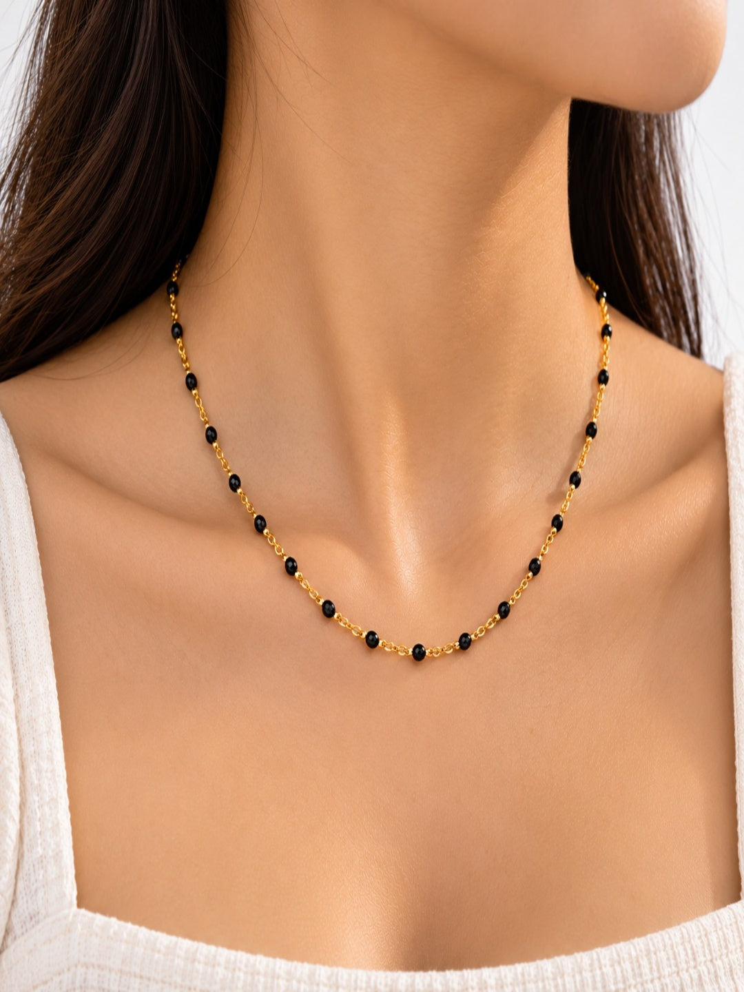 Black Beaded Gold Accent Necklace