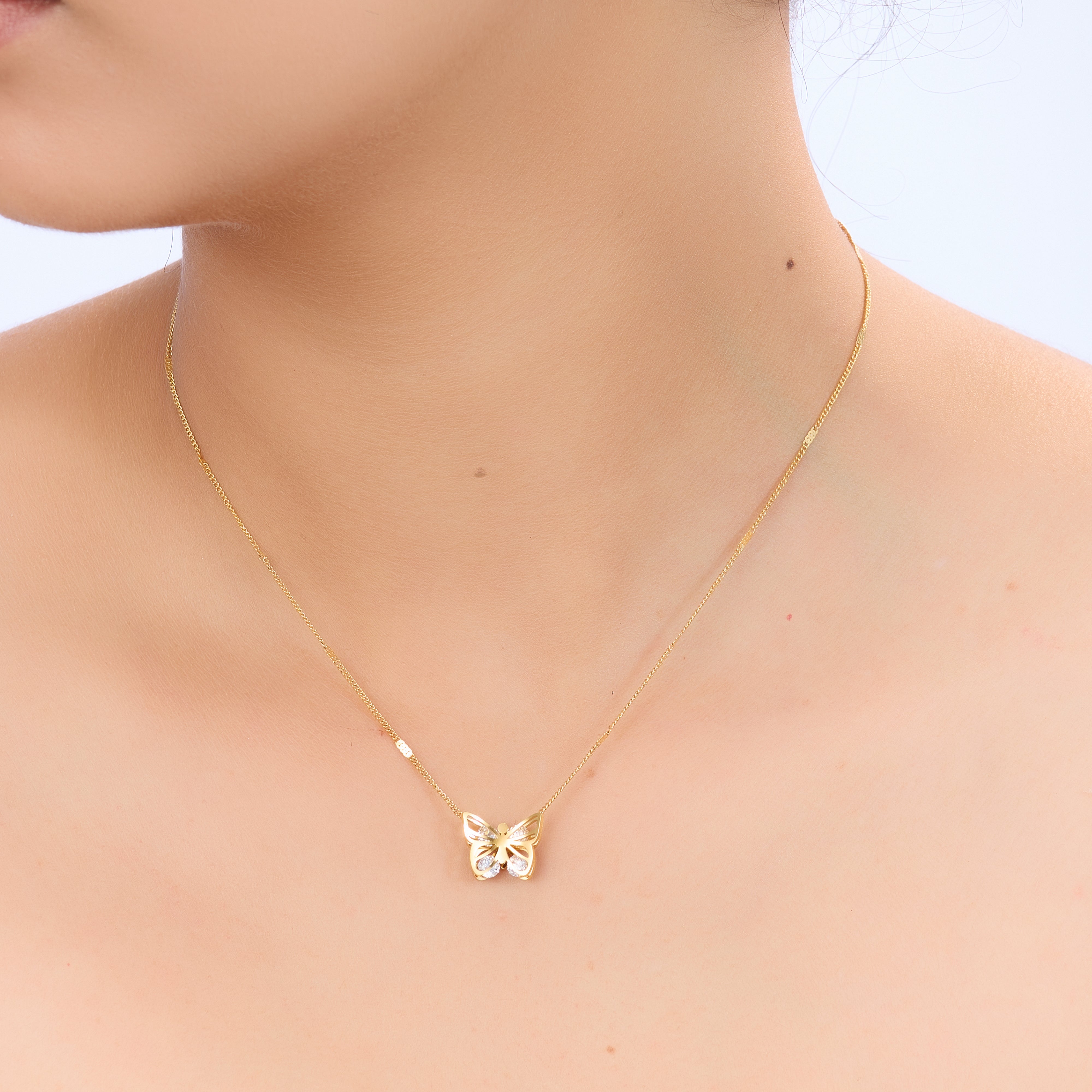 Golden Flutter Butterfly Pendant