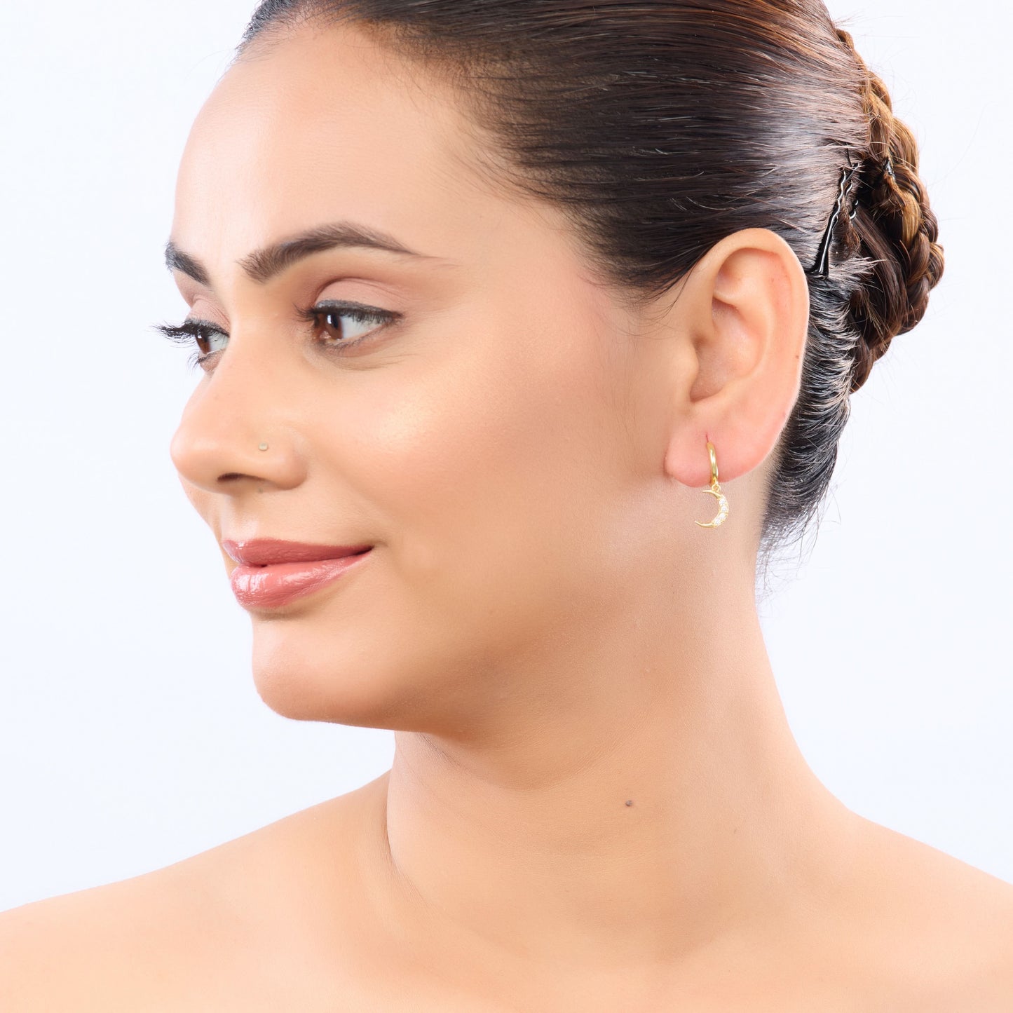 Edge Celestial Moon & Star Mismatched Huggie Earrings – CZ crescent moon and starburst huggie earrings in gold-2
