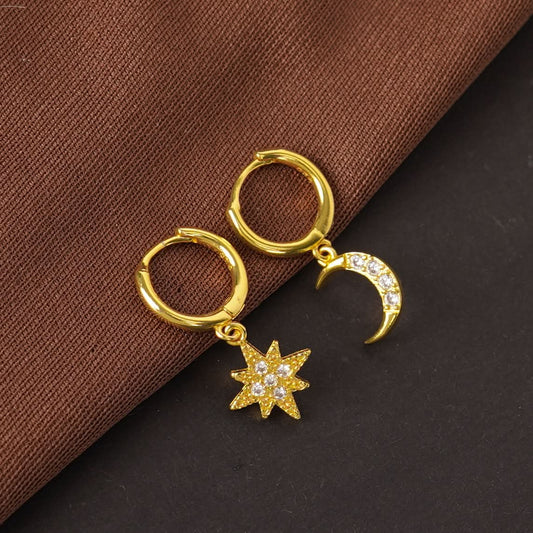 Edge Celestial Moon & Star Mismatched Huggie Earrings – CZ crescent moon and starburst huggie earrings in gold-3