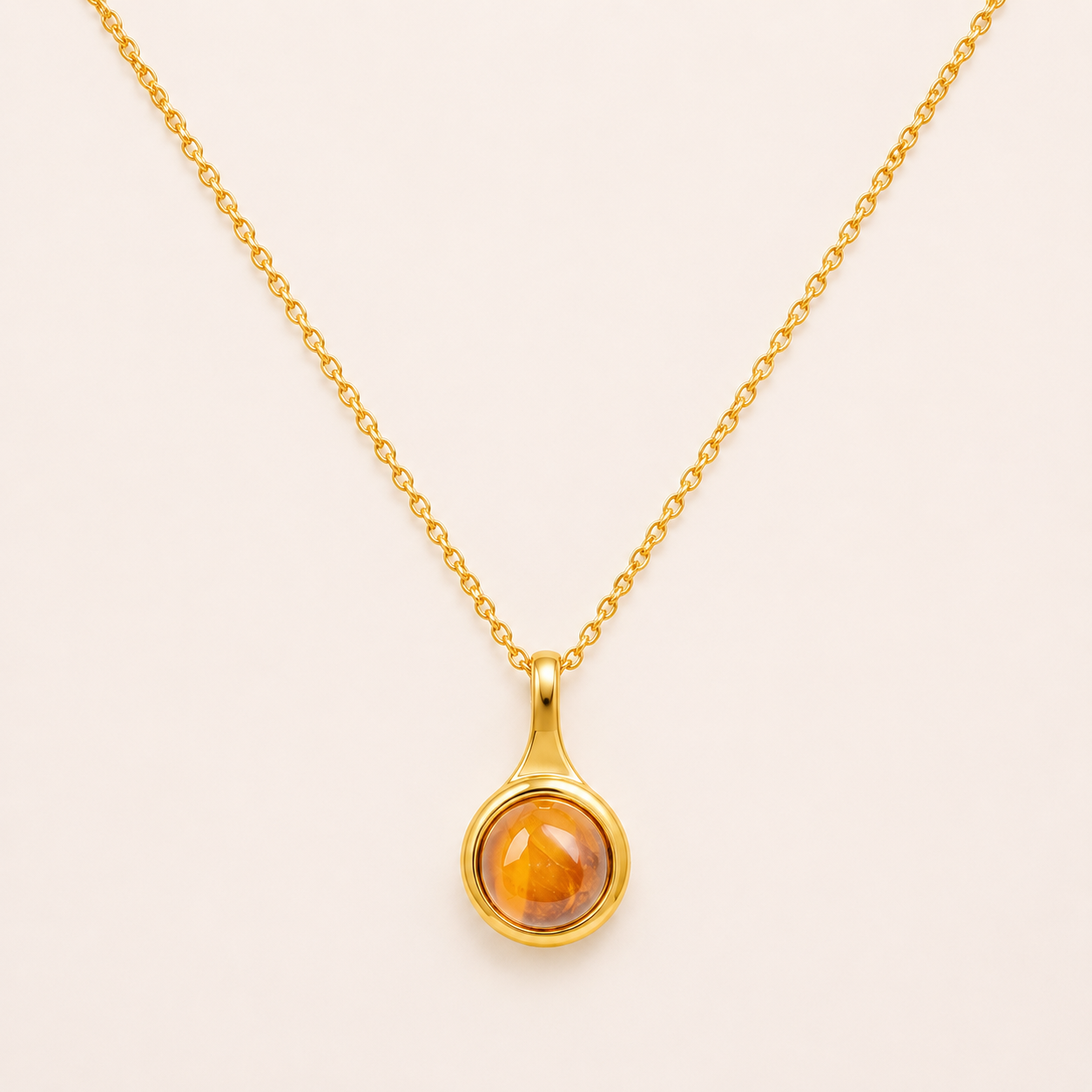 Chinoiserie-inspired round gold pendant necklace with Eastern artistic motif design