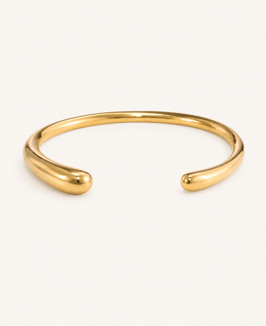 Circle luxe minimal open cuff gold bangle with smooth rounded ends and polished finish