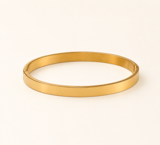 Classic feminine solid gold bangle with elegant pattern and adjustable chain closure-2