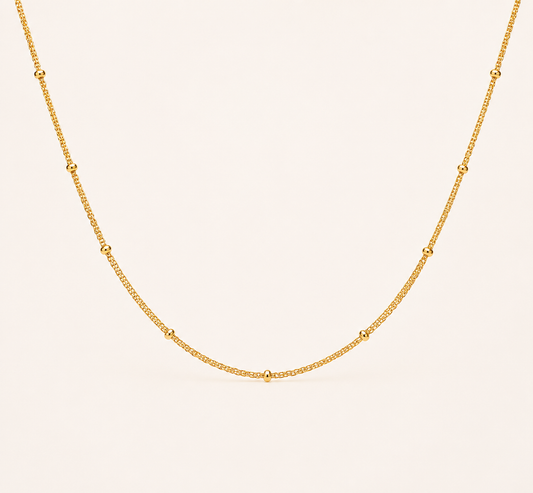 Classic Figaro pattern gold chain necklace with alternating links and high-polish finish