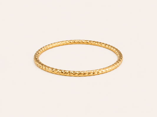 Classic geometric profile smooth gold bangle with elegant flat finish for daily stacking