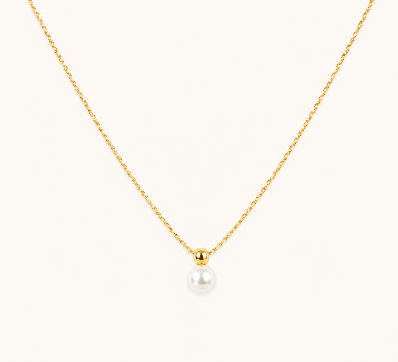 Classic luminous round gold pendant necklace with high-shine polished finish on fine chain