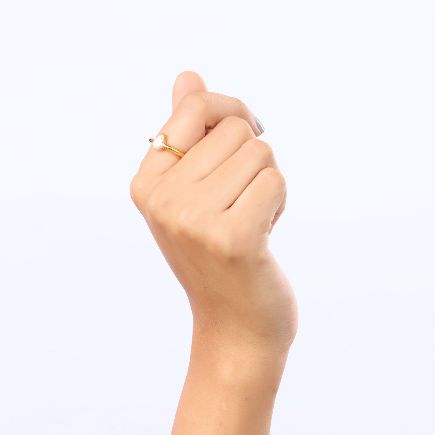 Classic pear-cut teardrop CZ solitaire ring with smooth high-polish gold-tone band-4