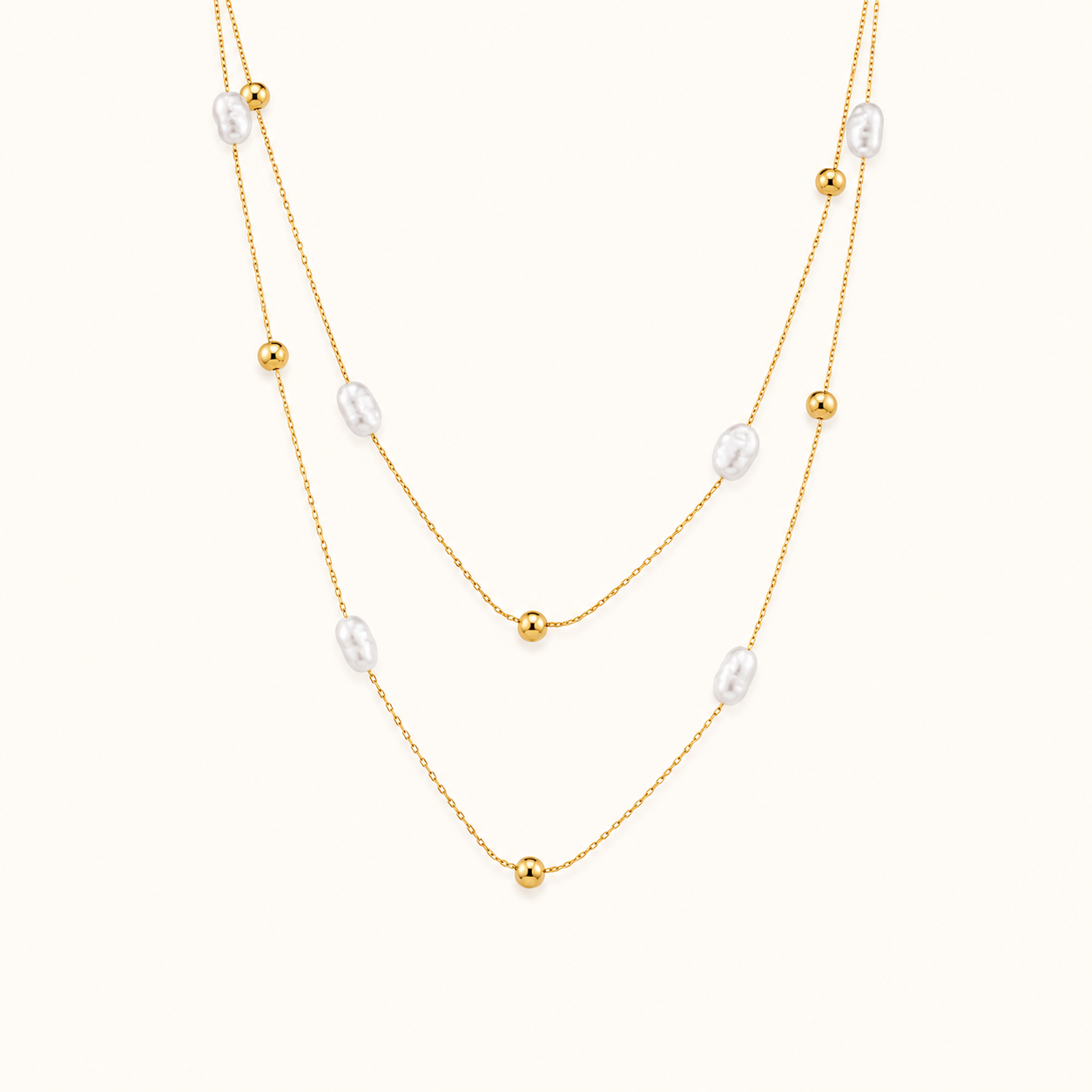 Classic pearl-style bead gold pendant necklace inspired by evergreen pearl elegance