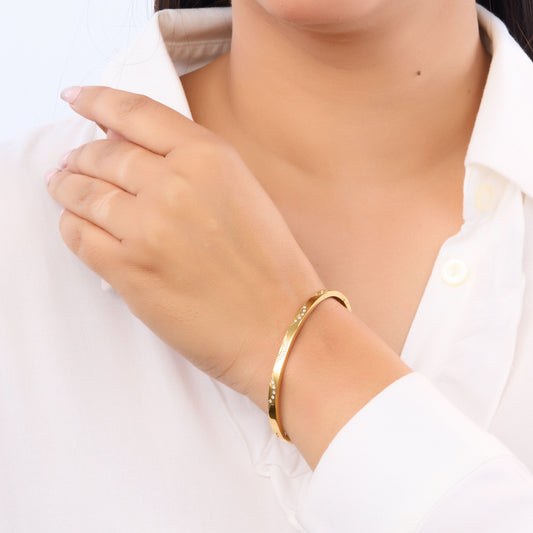 Classic radiance solid gold bangle with flawless gold-tone finish, waterproof and stackable
