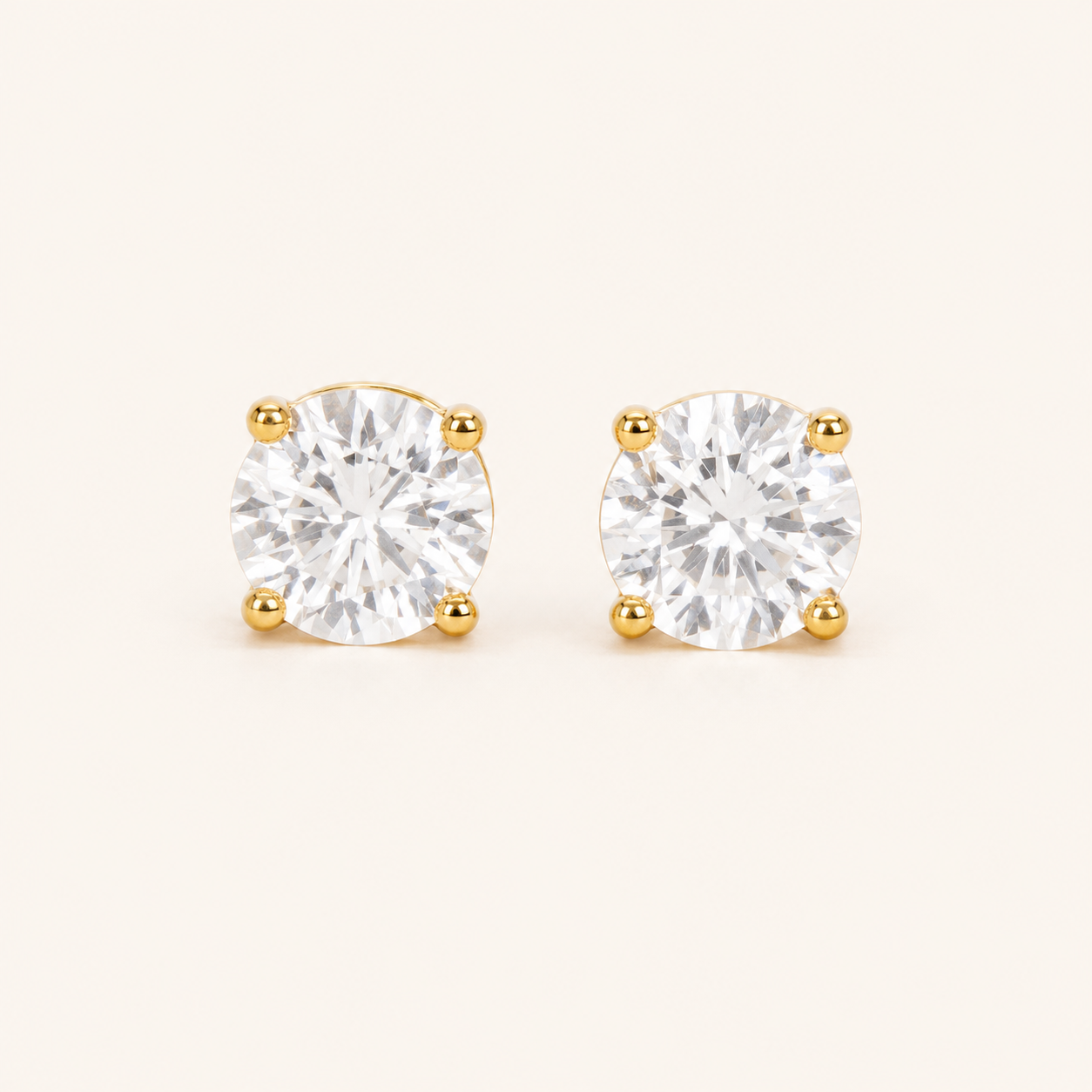Classic round solitaire CZ crystal stud earrings in 18K gold plating with push-back closure