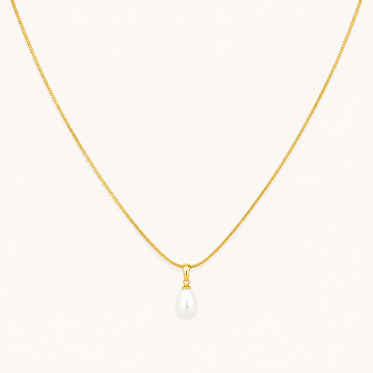 Classic single white pearl drop pendant necklace on fine gold chain with lobster clasp