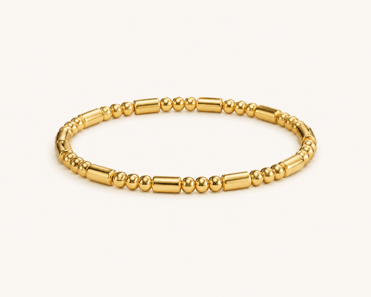 Classic slim solid gold bangle with lobster clasp and glossy gold-tone finish-2