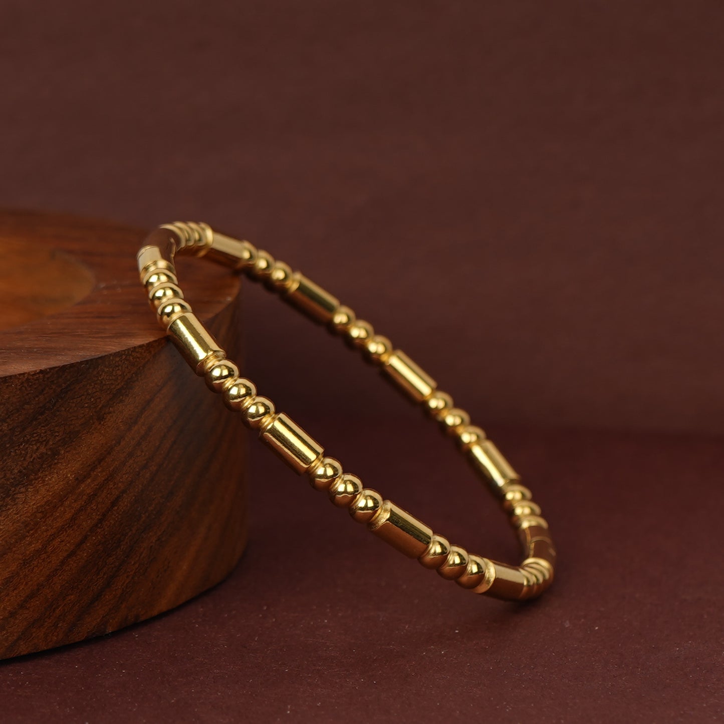 Classic slim solid gold bangle with lobster clasp and glossy gold-tone finish-6