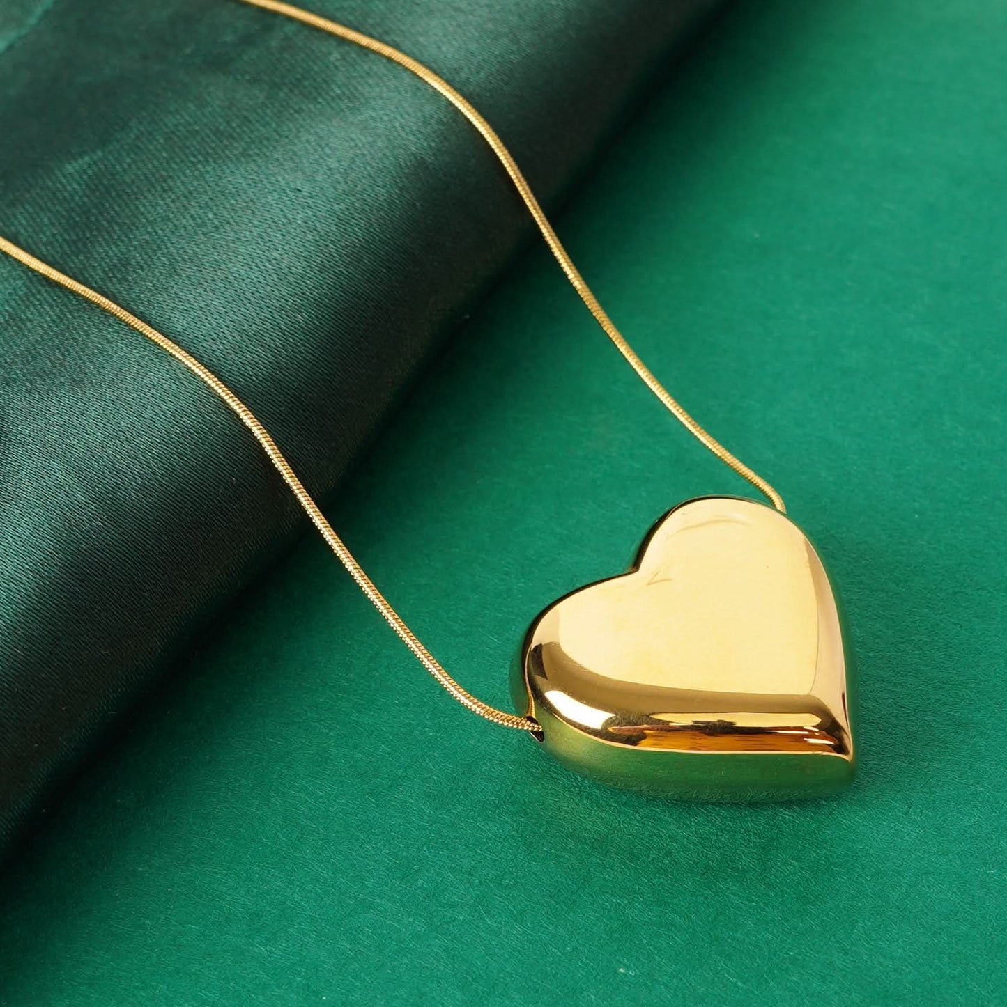 Classic soft heart pendant gold necklace with polished gold-tone finish on fine chain-2