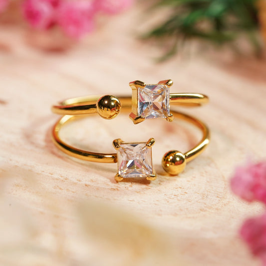 Dual-Glitz Bypass Ring – twin square-cut crystal open-ended bypass ring in 18K gold plated finish-5