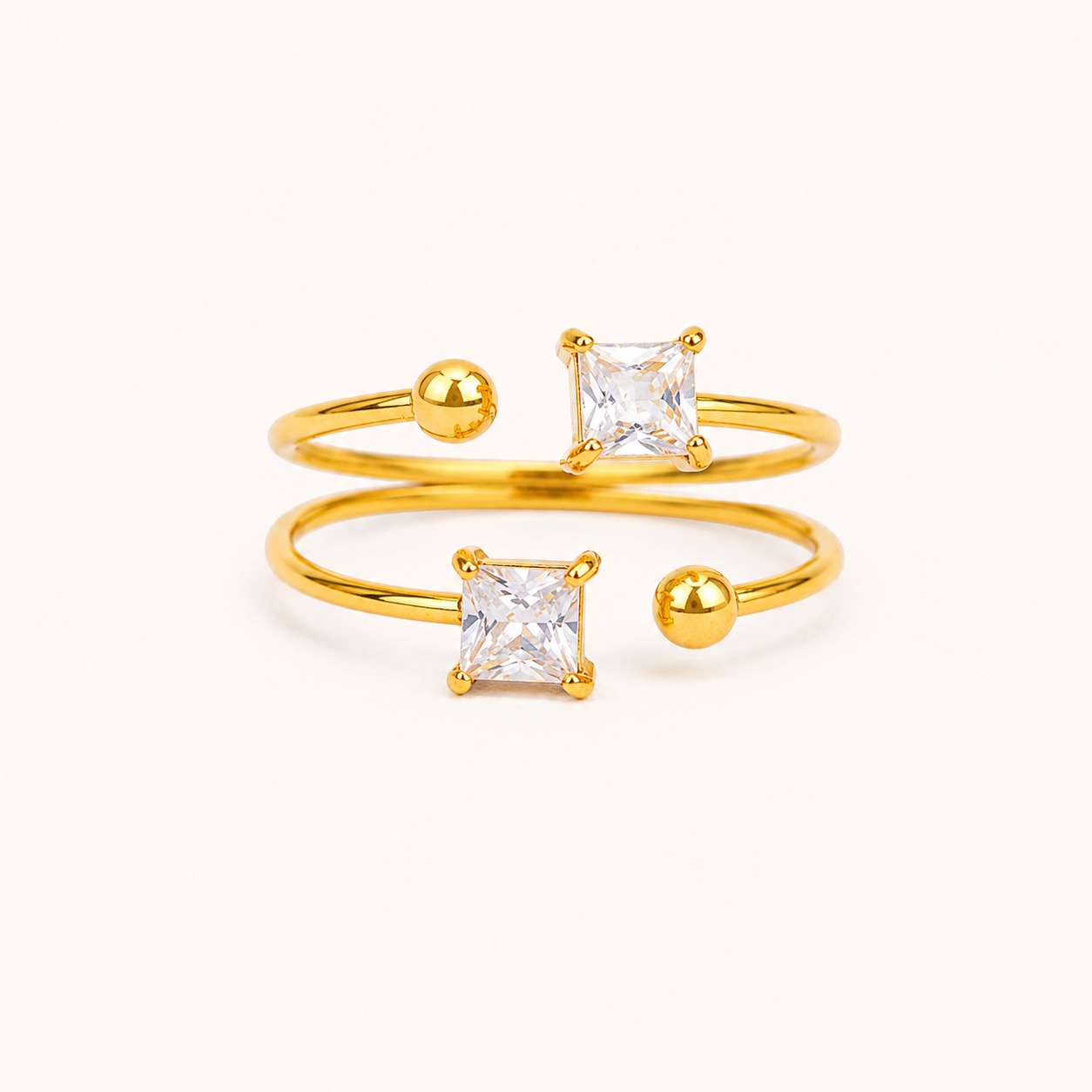Dual-Glitz Bypass Ring – twin square-cut crystal open-ended bypass ring in 18K gold plated finish