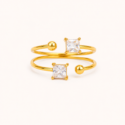 Dual-Glitz Bypass Ring – twin square-cut crystal open-ended bypass ring in 18K gold plated finish