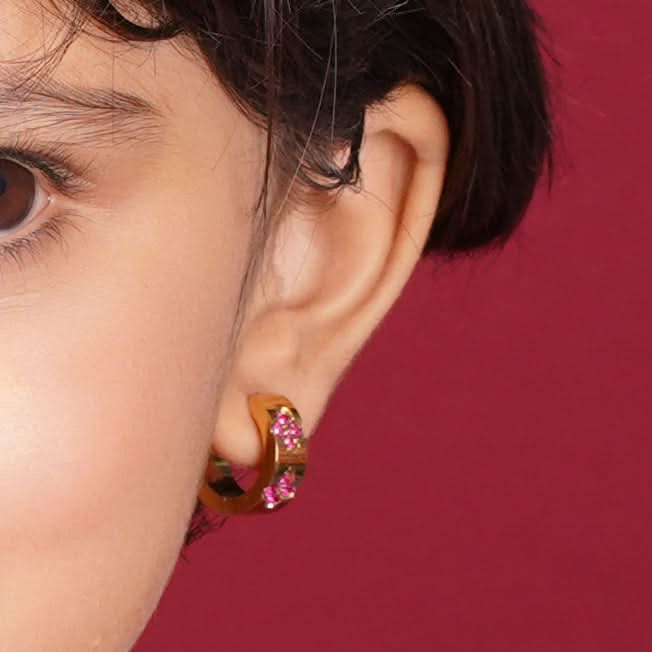 Edge Clover Crystal Huggie Hoop Earrings – wide-profile gold plated huggie hoops with clover crystal motifs-2