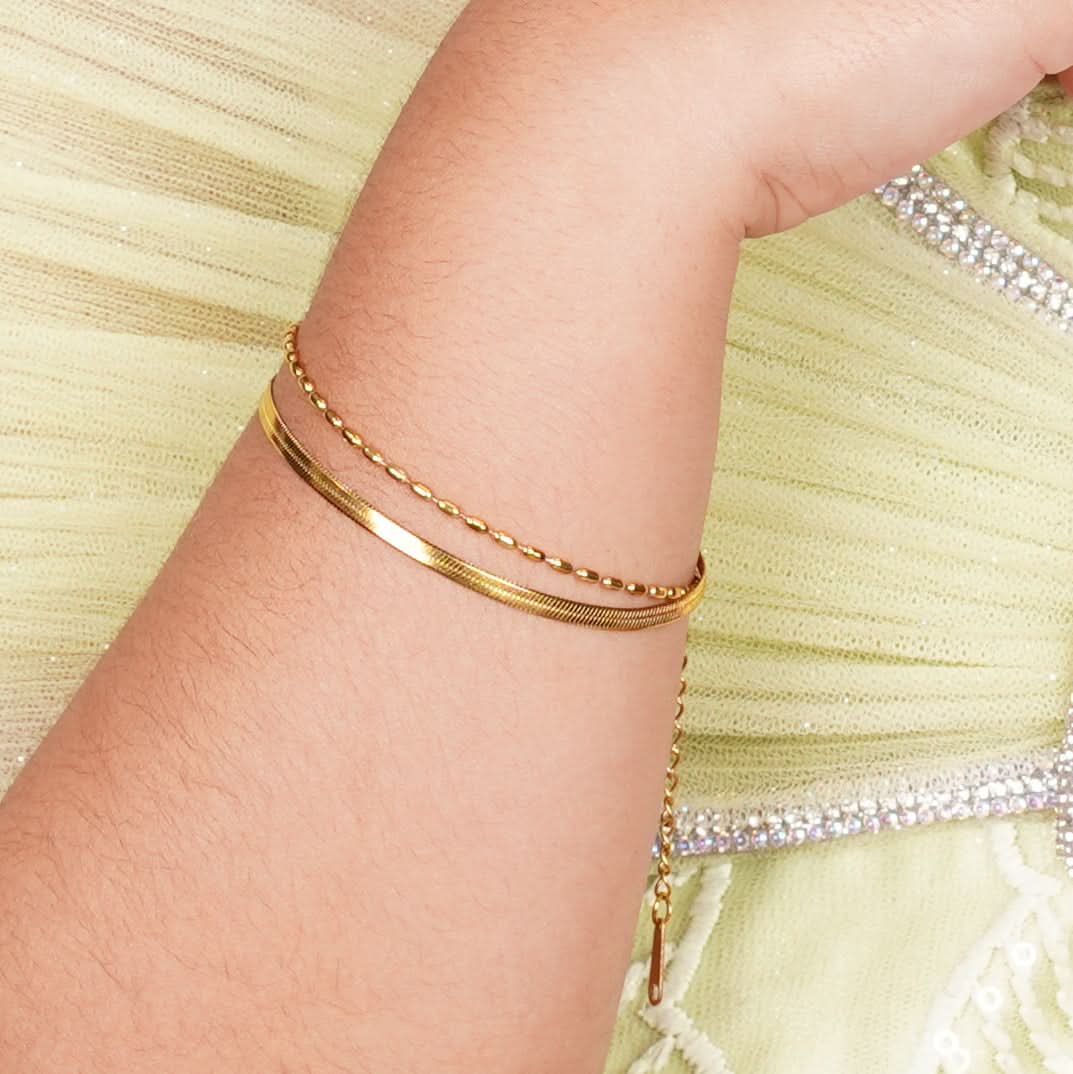 Gilded Ribbon & Orb Duo Bracelet – pre-stacked flat snake chain and oval-bead strand bracelet in 18K gold plated finish-2