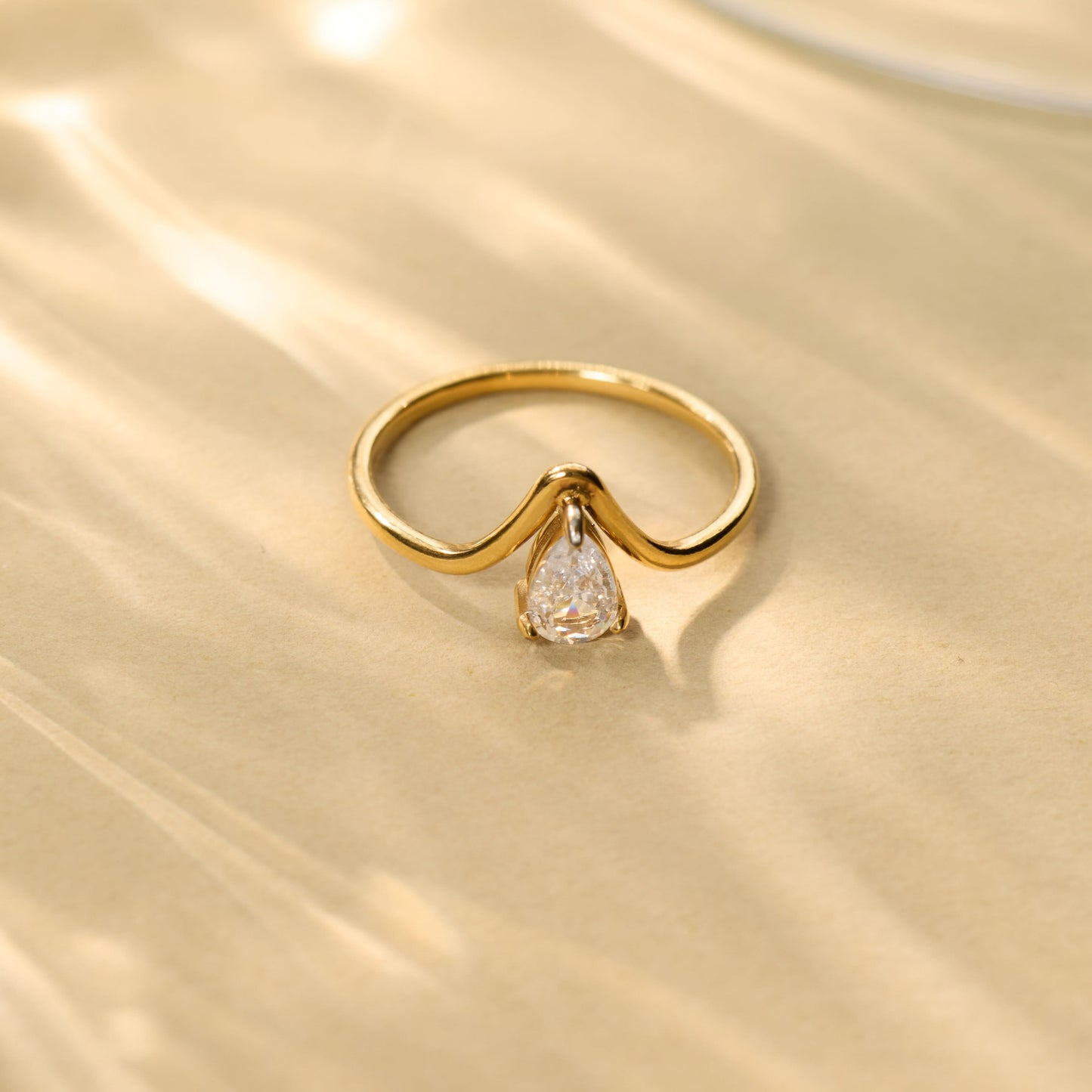 Gilded V-Pear Solitaire Ring – pear-cut V-prong solitaire ring in 18K gold plated finish for women-8