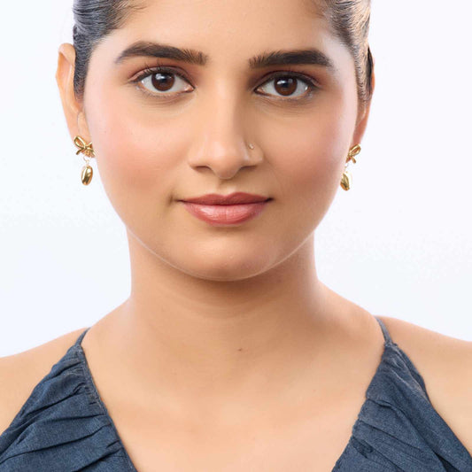 Gold Bow Knot & Heart Drop Earrings – bow knot and hanging heart drop earrings in 18K gold PVD for women-4