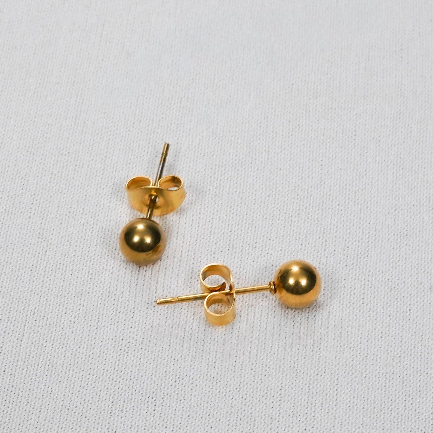 Gold Dome Stud Earrings – side profile showing the smooth half-dome shape