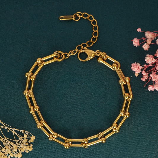 Gold Paperclip Link Bracelet – worn on wrist, high-shine paperclip chain for daily wear