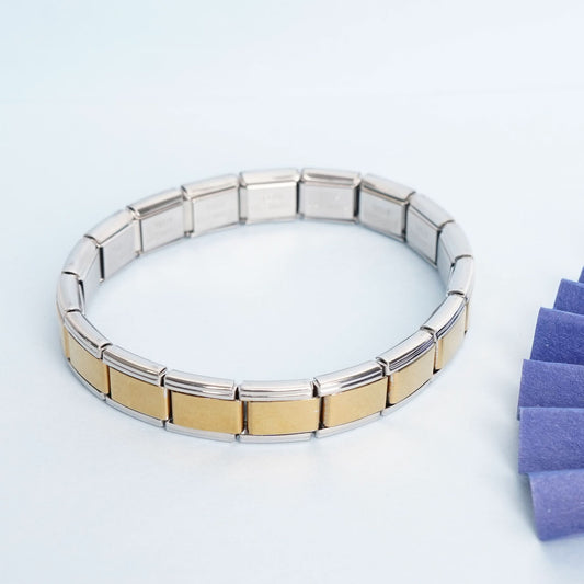 Gold & Silver Steel Link Bracelet – worn on wrist, dual-tone steel link chain for daily wear