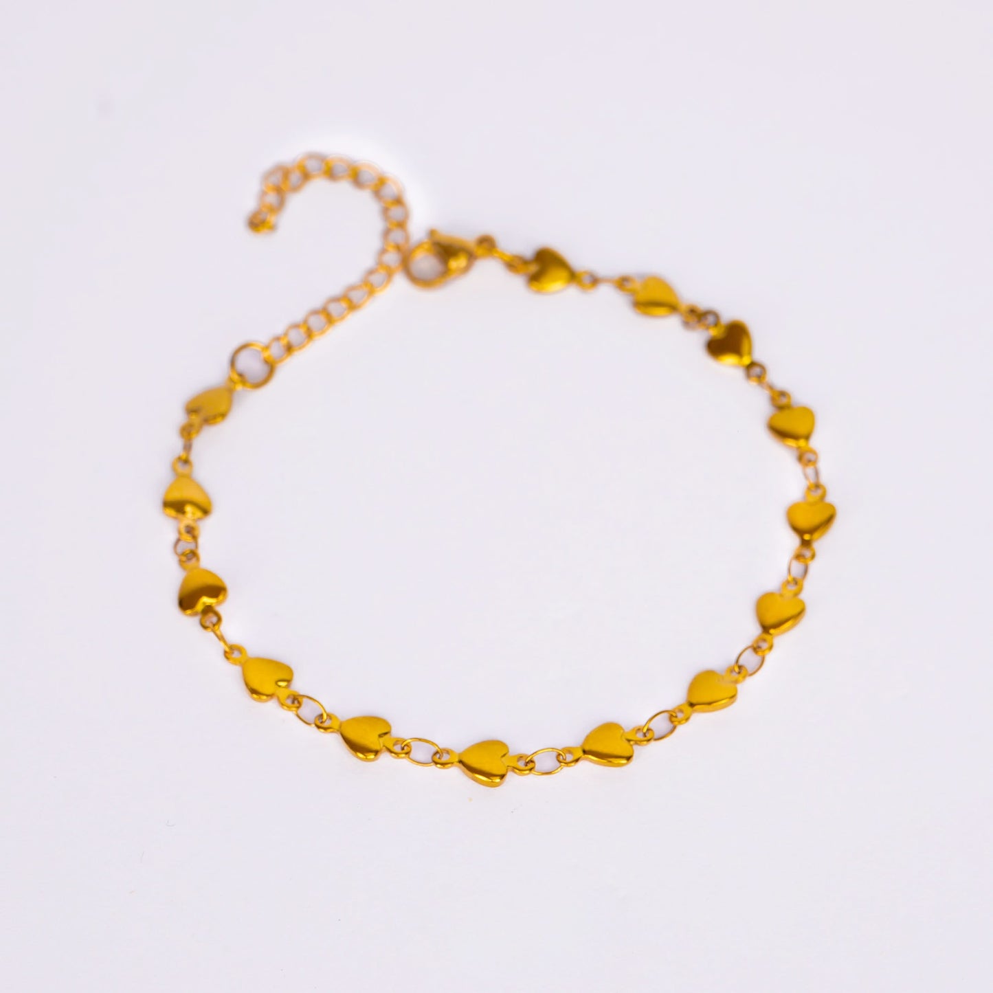 Gold-Toned Heart-Link Bracelet – close-up of the alternating heart-link detail
