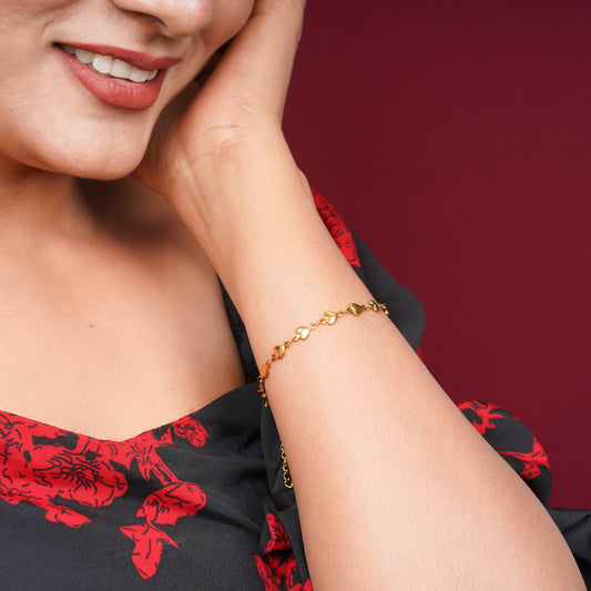 Gold-Toned Heart-Link Bracelet – worn on wrist, warm gold heart chain bracelet
