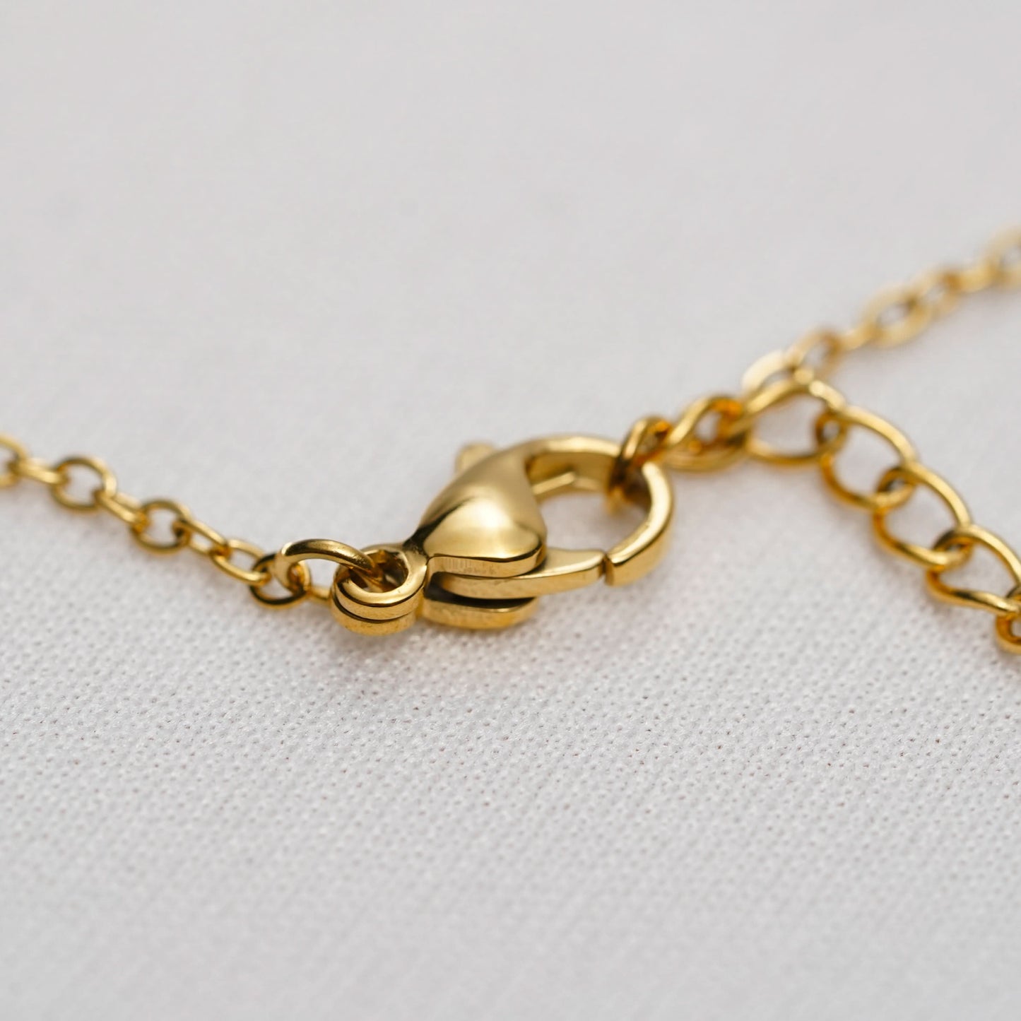 Gold-Toned Heart-Link Bracelet – angled view of the heart link pattern