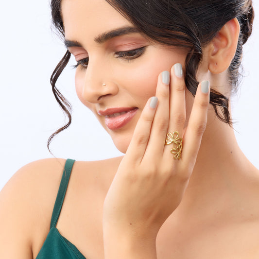 Golden Bloom Flower Ring – top-down view of the botanical bloom design
