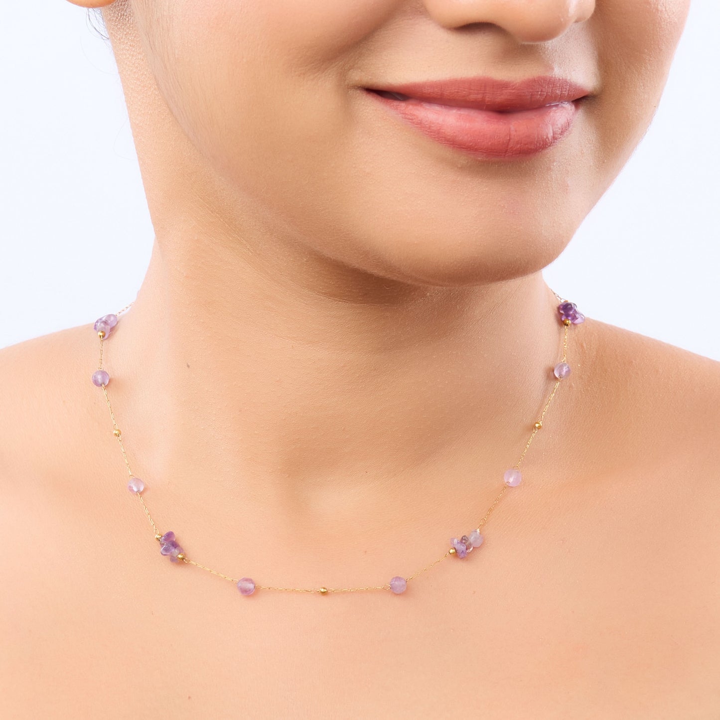 Golden Bloom Pastel Crystal Station Necklace – worn on neckline, gold-tone pastel station necklace
