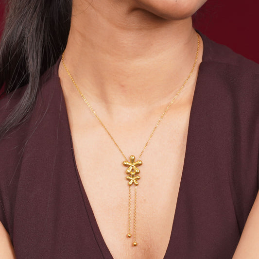 Golden Bloom Pendant Necklace – close-up of the botanical flower pendant