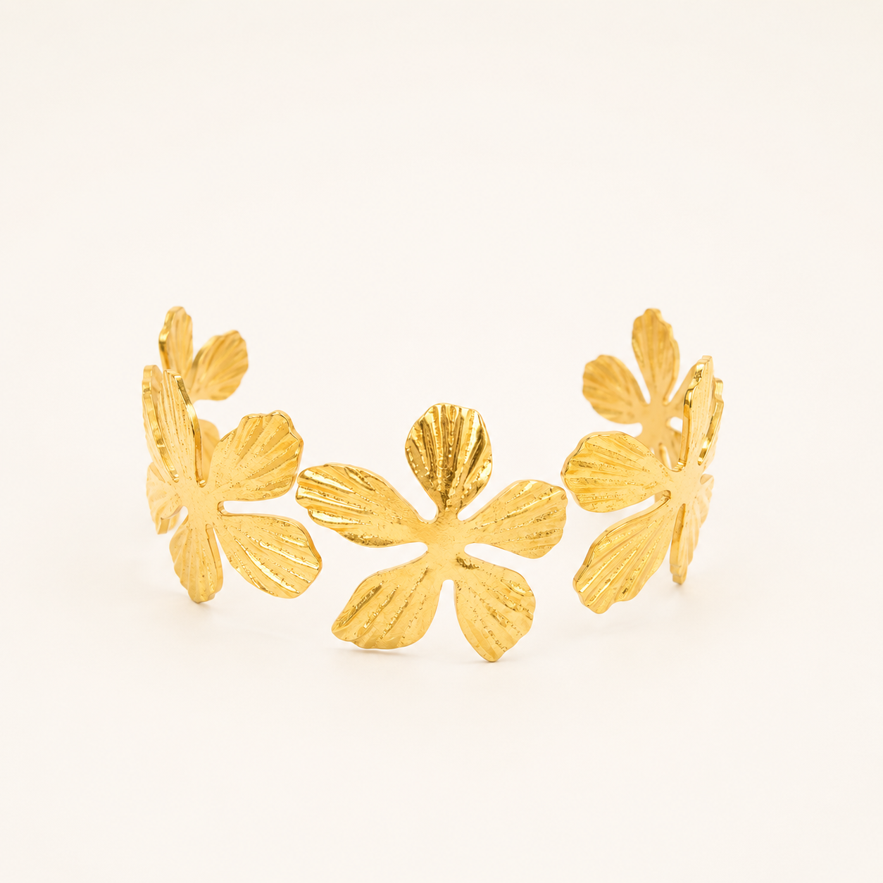 Golden Blossom Geometric Hammered Bangle – close-up of the hammered geometric texture