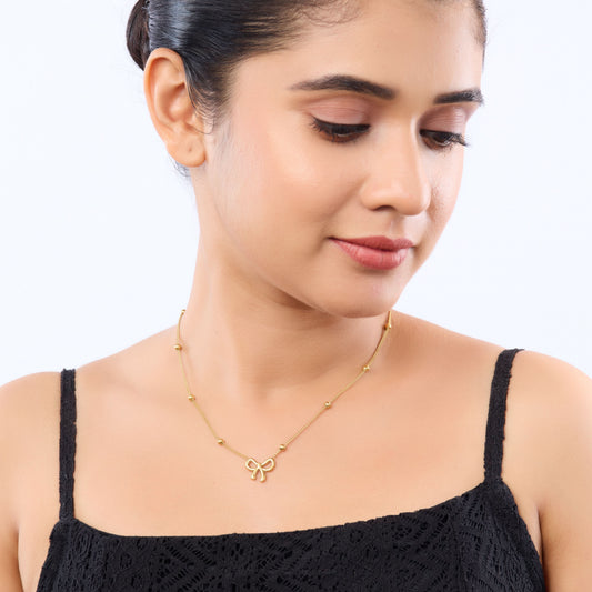 Golden Bow Charm Necklace – chain and clasp detail view