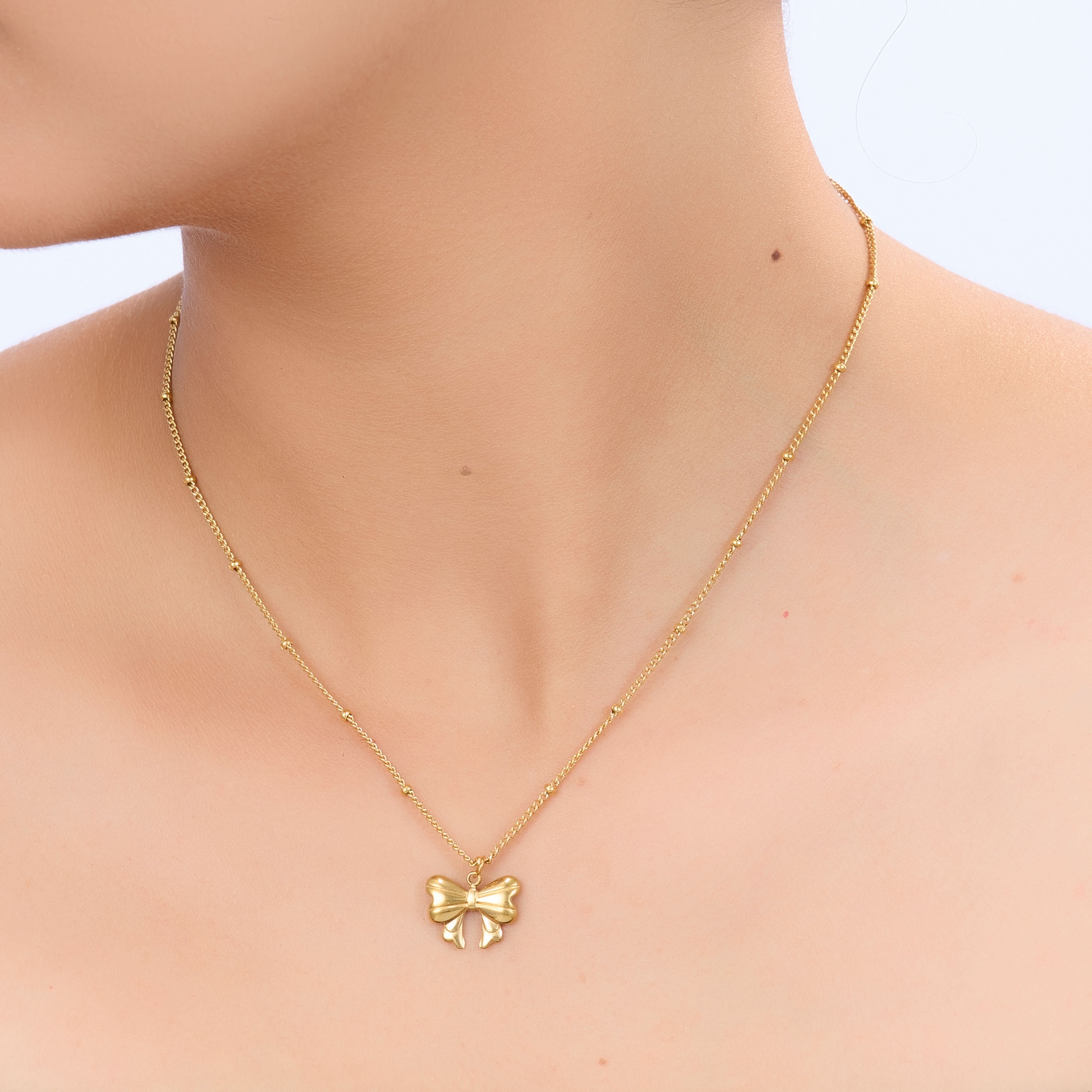Golden Butterfly Pendant Necklace – close-up of the delicate butterfly charm