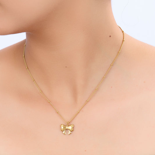 Golden Butterfly Pendant Necklace – close-up of the delicate butterfly charm