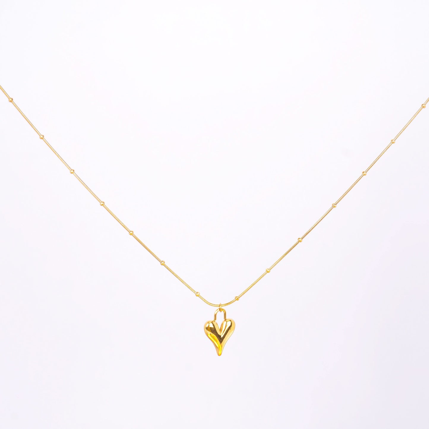 Golden Clip-Heart Classic Necklace – worn on neckline, classic heart pendant necklace