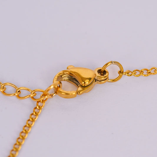 Golden Daisy Number Bracelet – worn on wrist, personalised daisy charm bracelet