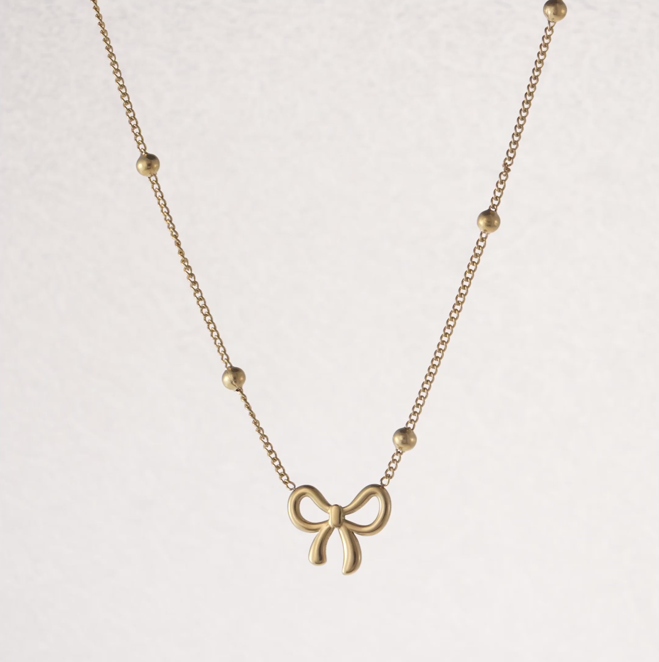 Golden Bow Charm